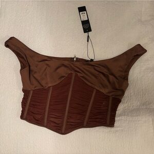 Brand new brown top. Slight off the shoulder with sheer ribcage.
